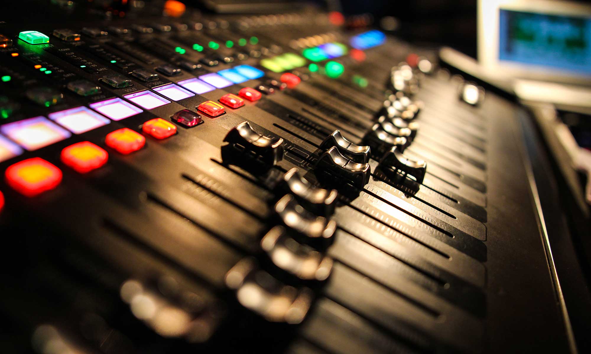Close up picture of live sound mixing board